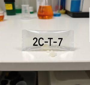 Buy Pure 2C-T-7 Canada – 99.9% high-purity 2C-T-7 HCl crystal in sealed ChemLabs Canada vial, GC-MS/NMR certificate visible, NOC-compliant lab-tested research chemical for Canadian forensic buyers.