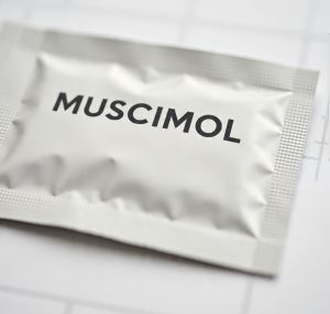 Buy Muscimol Canada – 99.9% pure muscimol HCl powder in sealed ChemLabs Canada vial, LC-MS/NMR certificate visible, lab-tested research chemical for Canadian buyers.