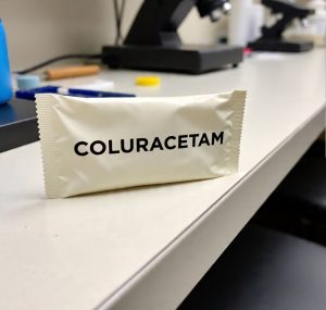 Buy Pure Coluracetam Canada – 99.9% high-purity coluracetam powder in sealed ChemLabs Canada vial, LC-MS/NMR certificate visible, lab-tested research chemical for Canadian buyers.