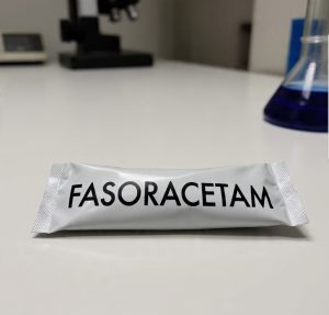 Buy Fasoracetam Canada – 99.9% high-purity fasoracetam monohydrate powder in sealed ChemLabs Canada vial, LC-MS/NMR certificate visible, lab-tested research chemical for Canadian buyers.